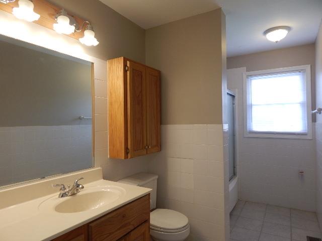 321 Hennessee Bridge Road Rock Island, TN 38581 - Photo 7 of 22 Full bath off hallway with new tile, paint, sink and toilet.