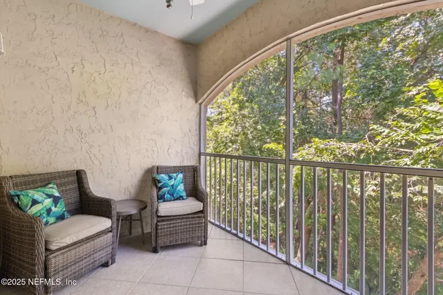 a bedroom with a bed and cabinets