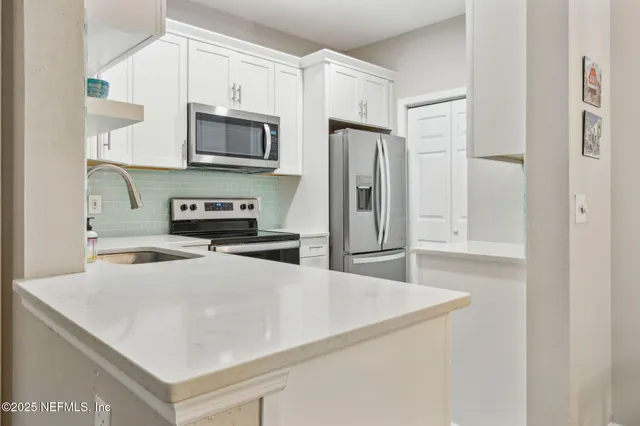 a view of street with sitting area