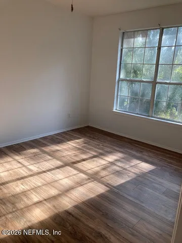 a house with palm trees in front of it