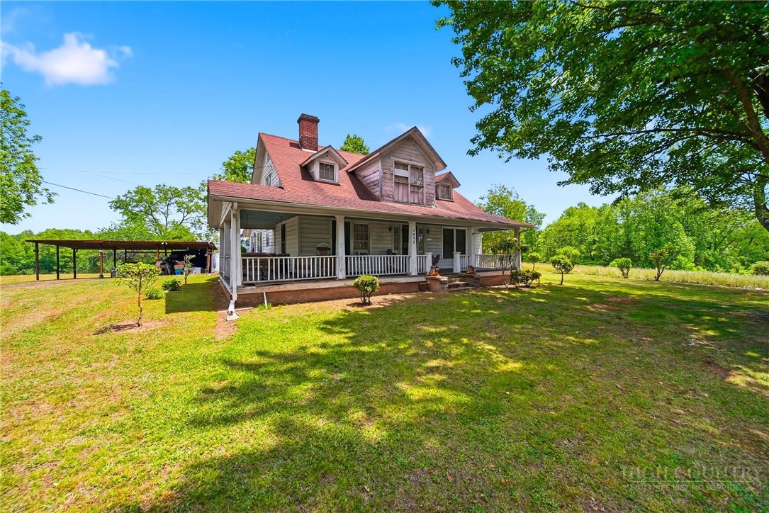 3450 Sparta Road North Wilkesboro, NC 28659 - Photo 25 of 34 a view of a house with a swimming pool