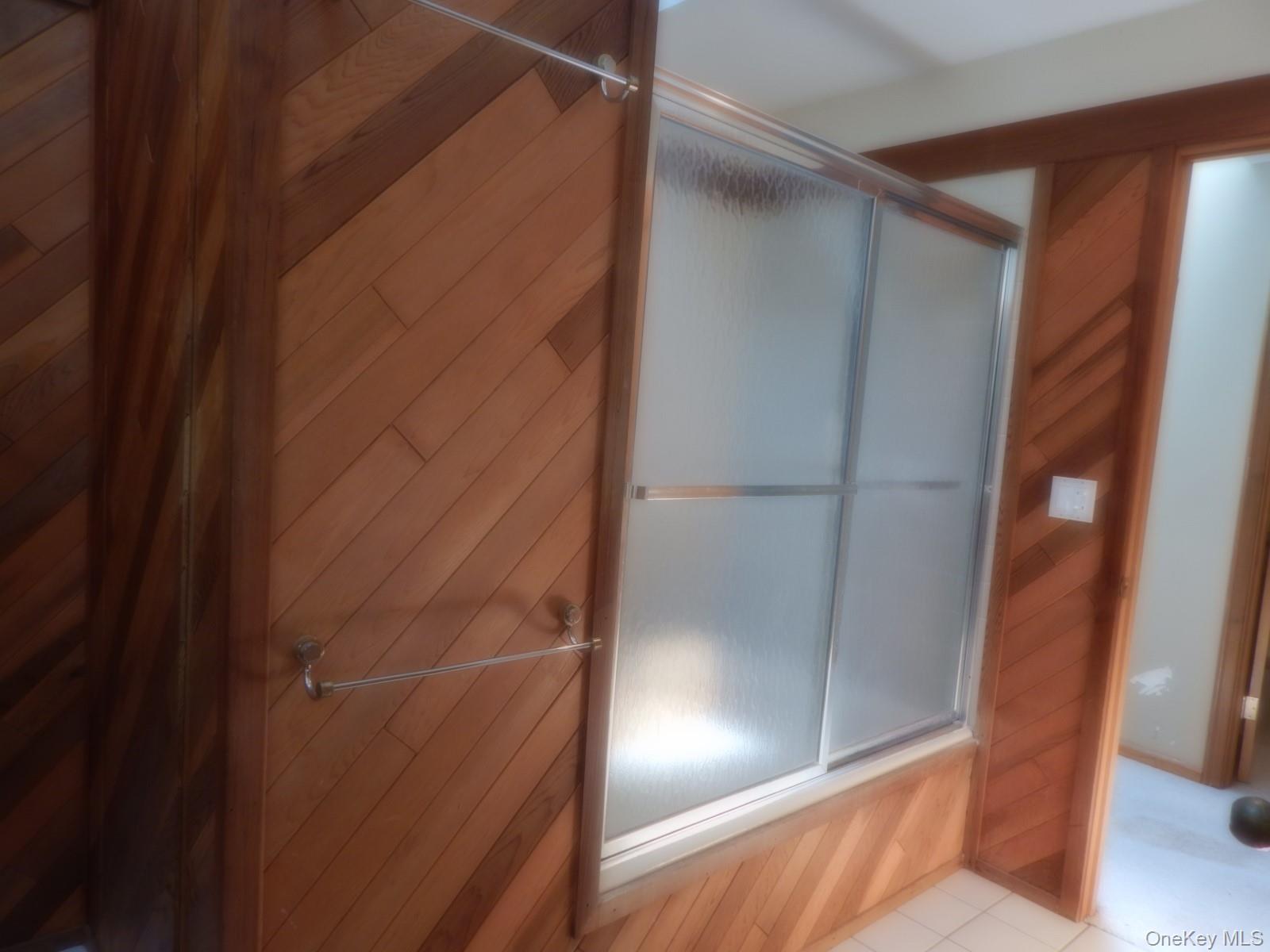 5 Eagle Head Road Cornwall-on-Hudson, NY 12520 - Photo 9 of 24 Full first floor bathroom with wooden walls