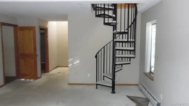 a view of entryway with a front door