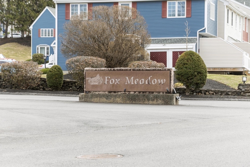 48 Fox Meadow Road, Unit F Leominster, MA 01453 - Photo 1 of 36 a sign on the side of a building
