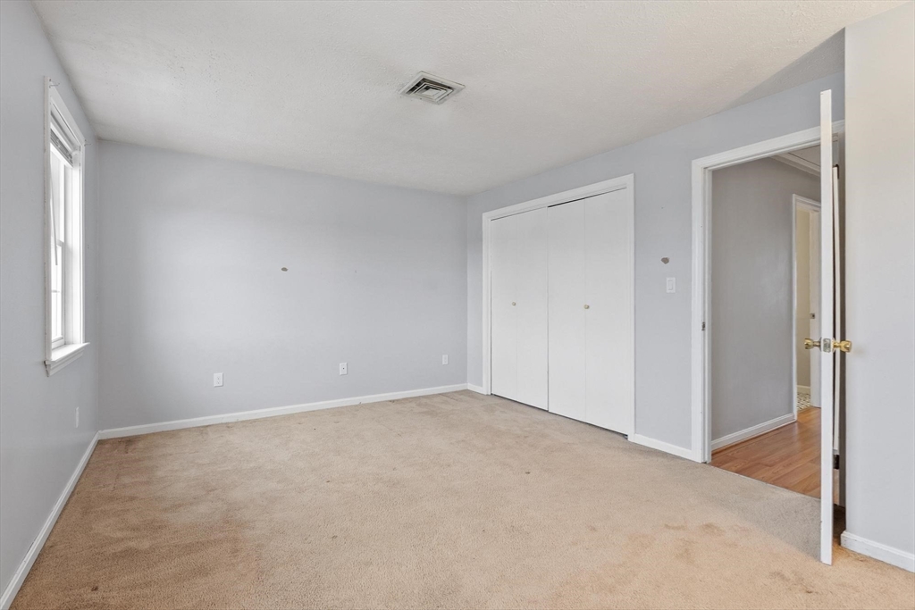 48 Fox Meadow Road, Unit F Leominster, MA 01453 - Photo 14 of 36 a view of an empty room with a window