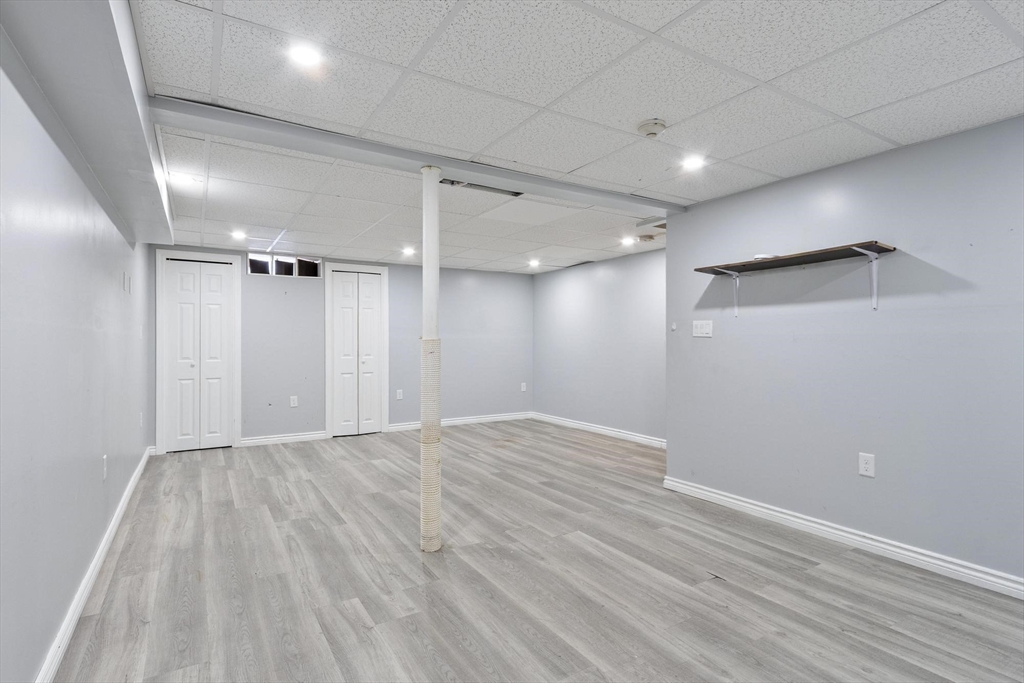 48 Fox Meadow Road, Unit F Leominster, MA 01453 - Photo 24 of 36 a view of empty room with wooden floor