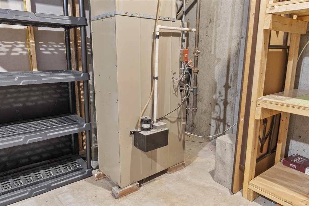 48 Fox Meadow Road, Unit F Leominster, MA 01453 - Photo 25 of 36 a view of flat screen tv and refrigerator