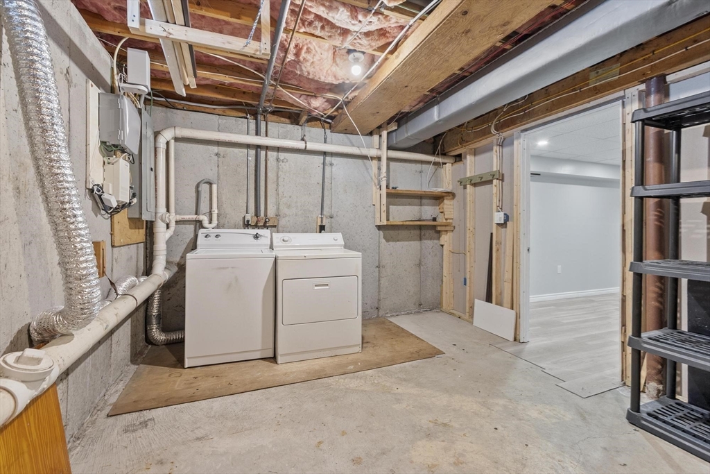 48 Fox Meadow Road, Unit F Leominster, MA 01453 - Photo 27 of 36 a utility room with dryer and washer