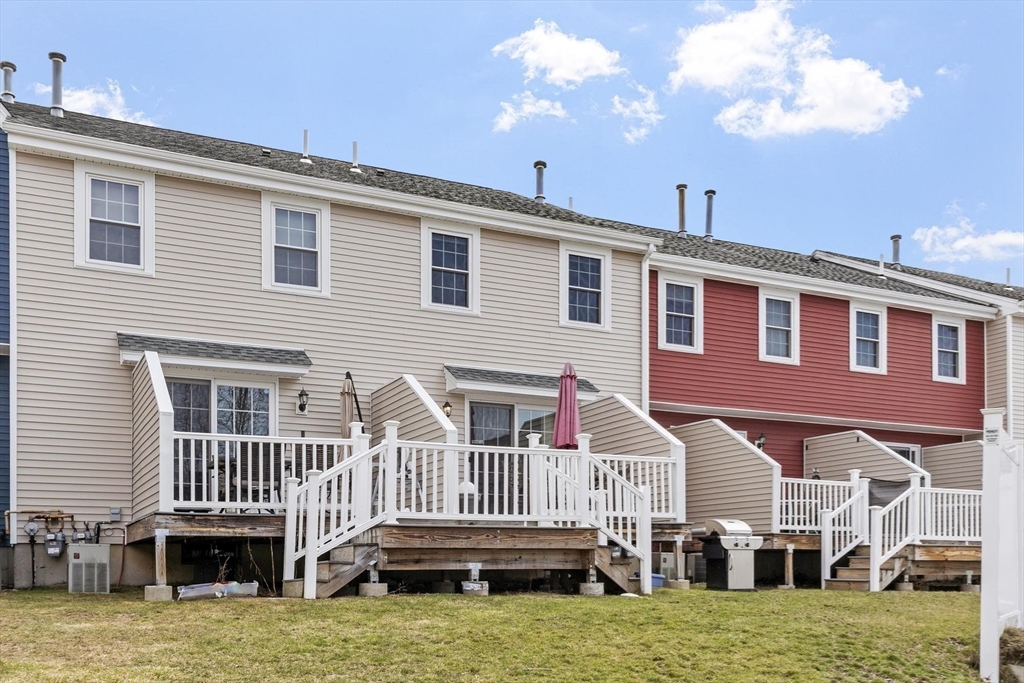 48 Fox Meadow Road, Unit F Leominster, MA 01453 - Photo 29 of 36 a view of a house with a swimming pool