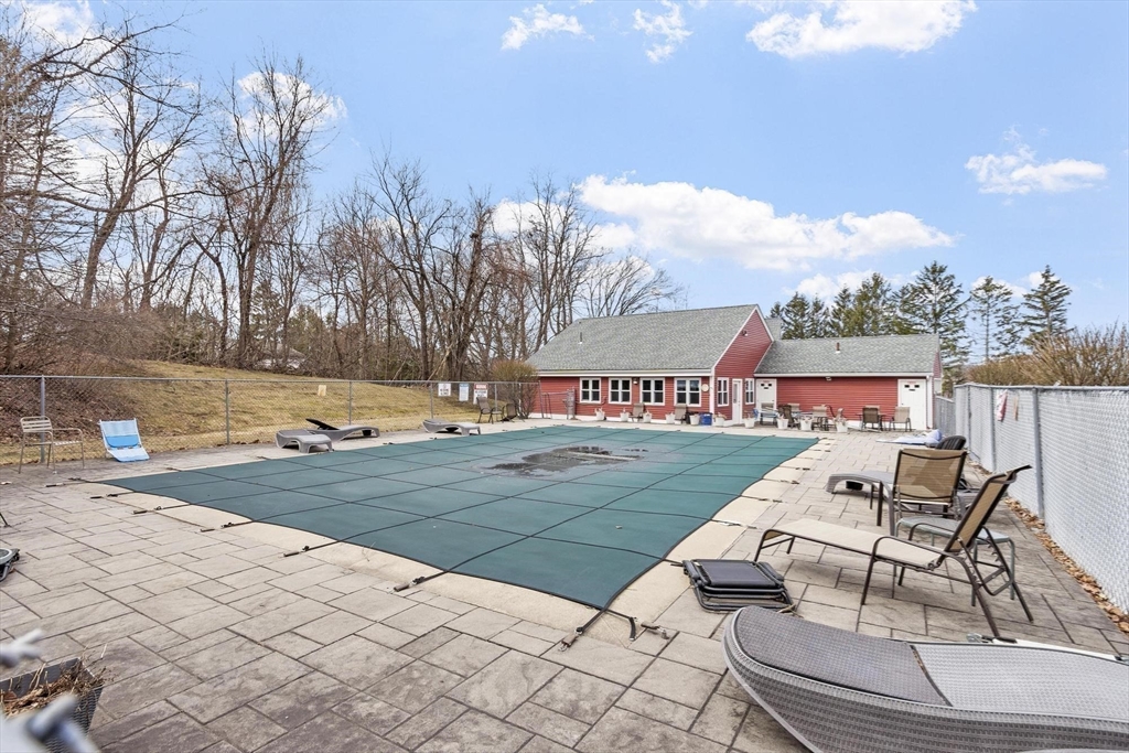 48 Fox Meadow Road, Unit F Leominster, MA 01453 - Photo 30 of 36 a view of a backyard