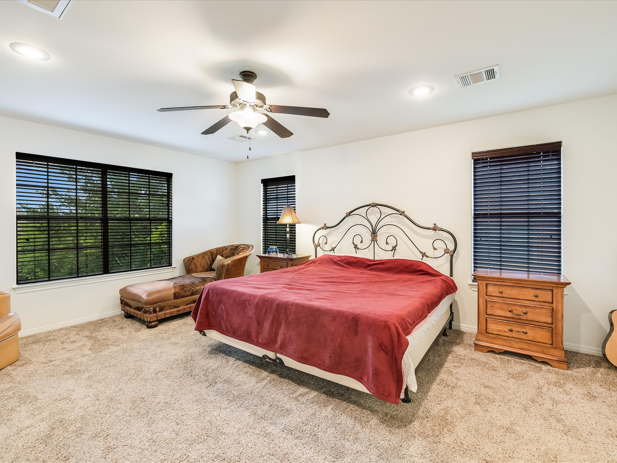 15214 Nightingale Lane Austin, TX 78734 - Photo 12 of 28 a bedroom with a bed and a window