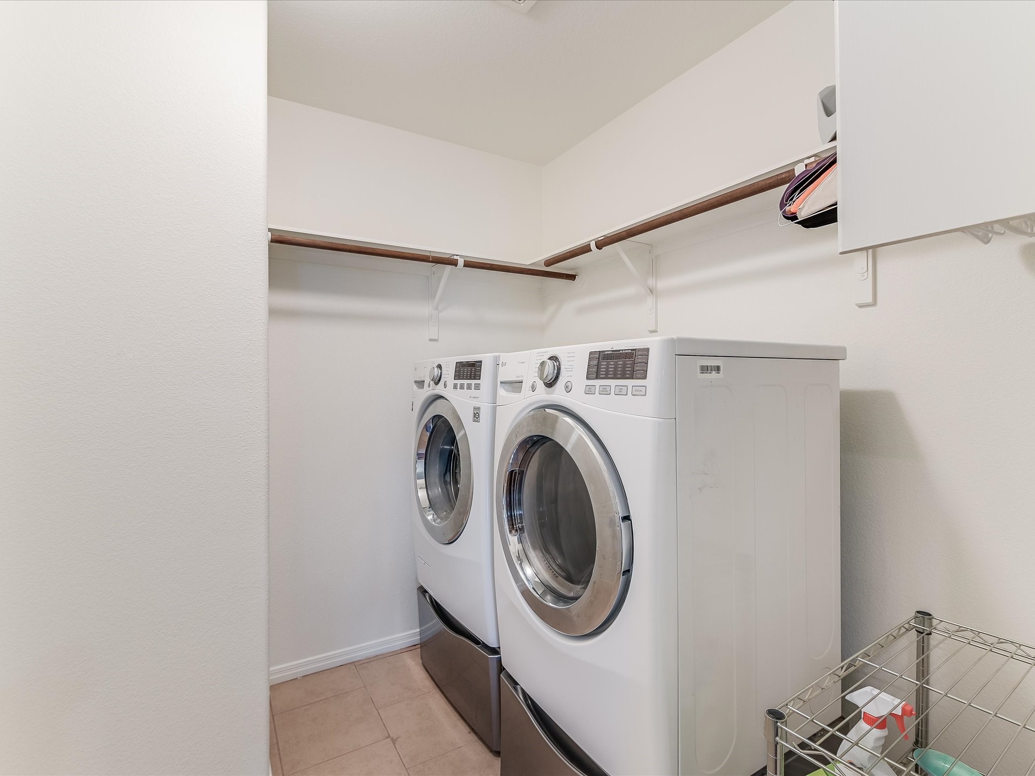 15214 Nightingale Lane Austin, TX 78734 - Photo 23 of 28 a utility room with dryer and washer