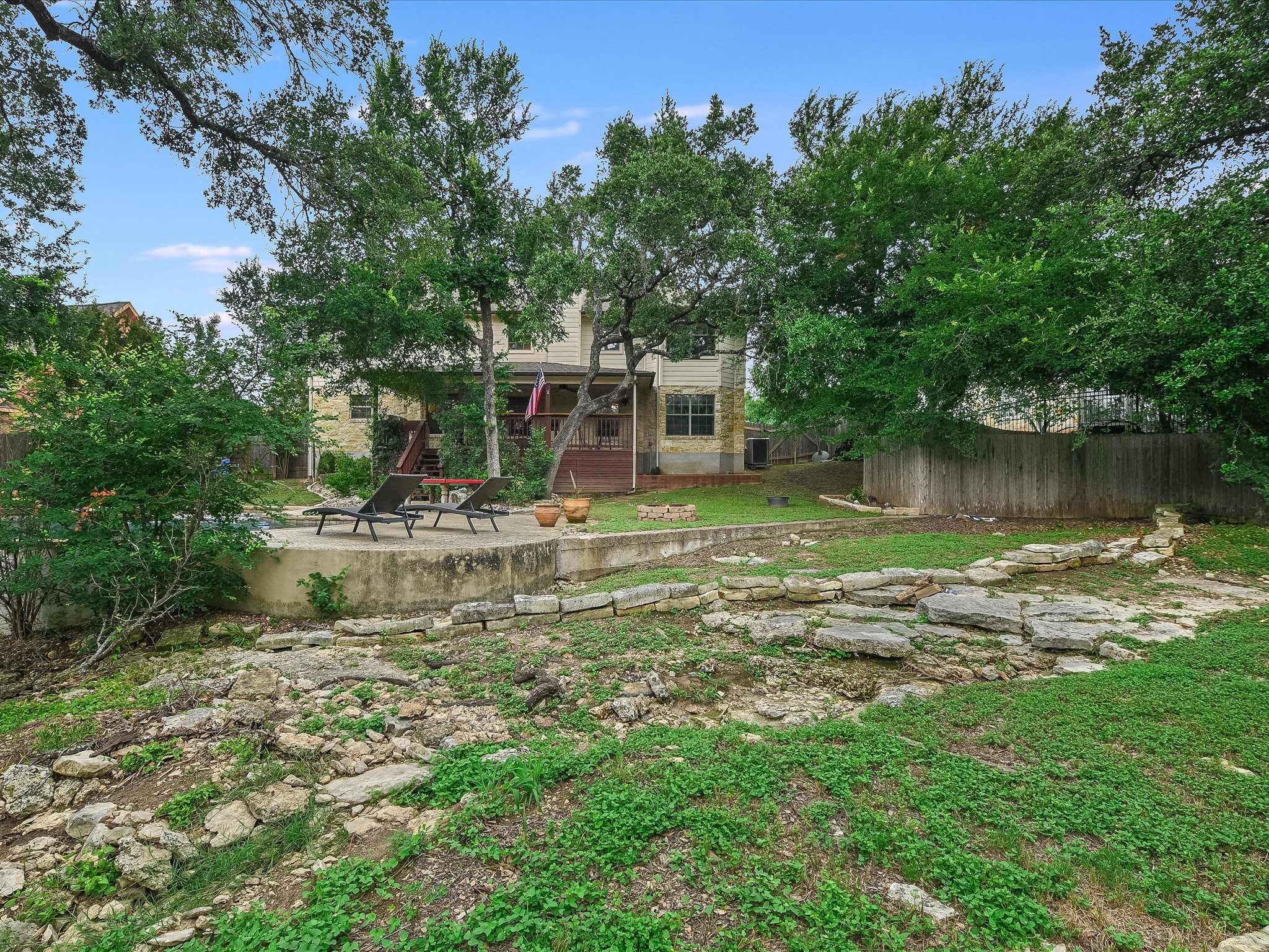 15214 Nightingale Lane Austin, TX 78734 - Photo 27 of 28 a view of a house with a yard
