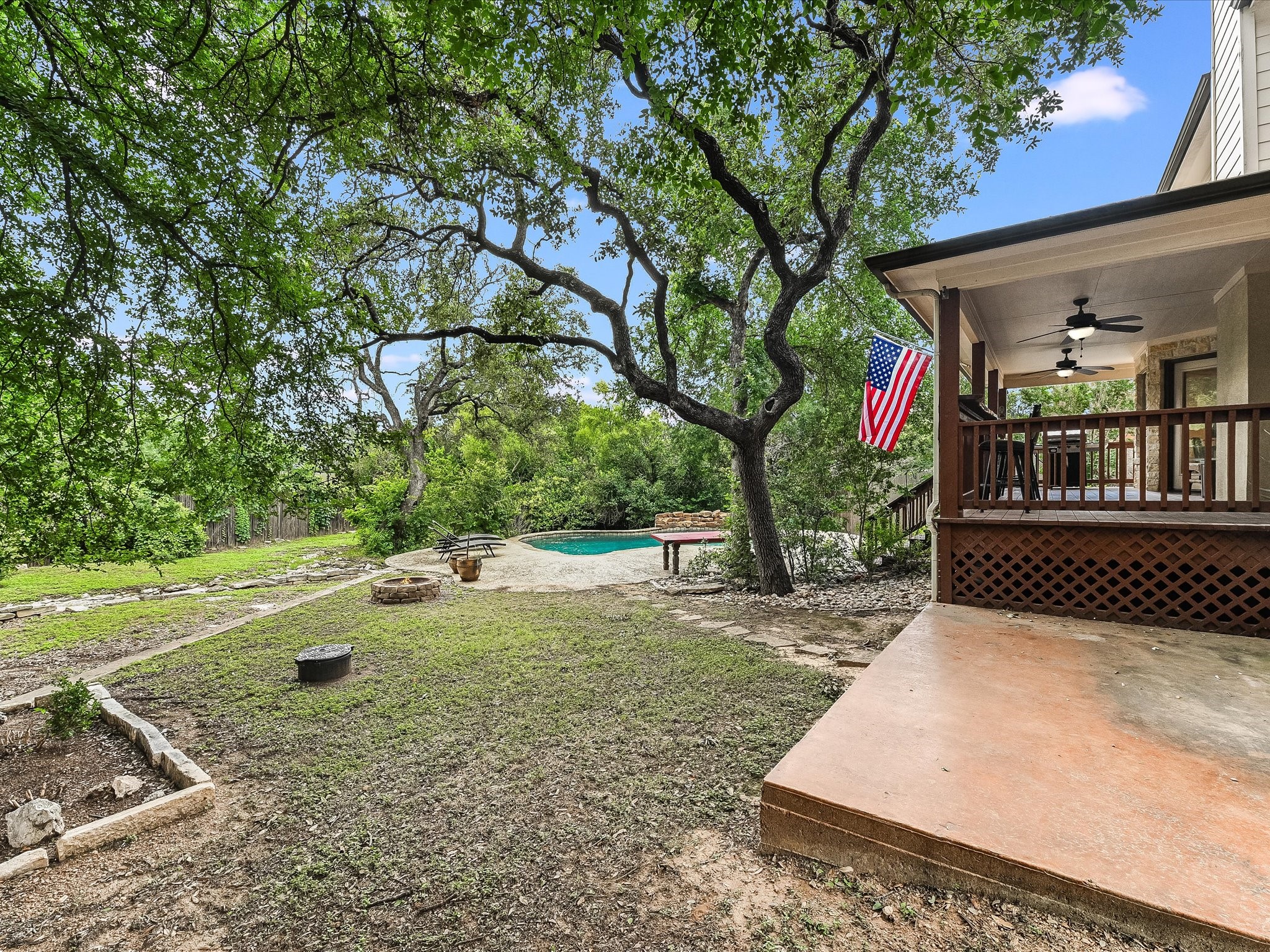 15214 Nightingale Lane Austin, TX 78734 - Photo 28 of 28 a view of a backyard with a tree