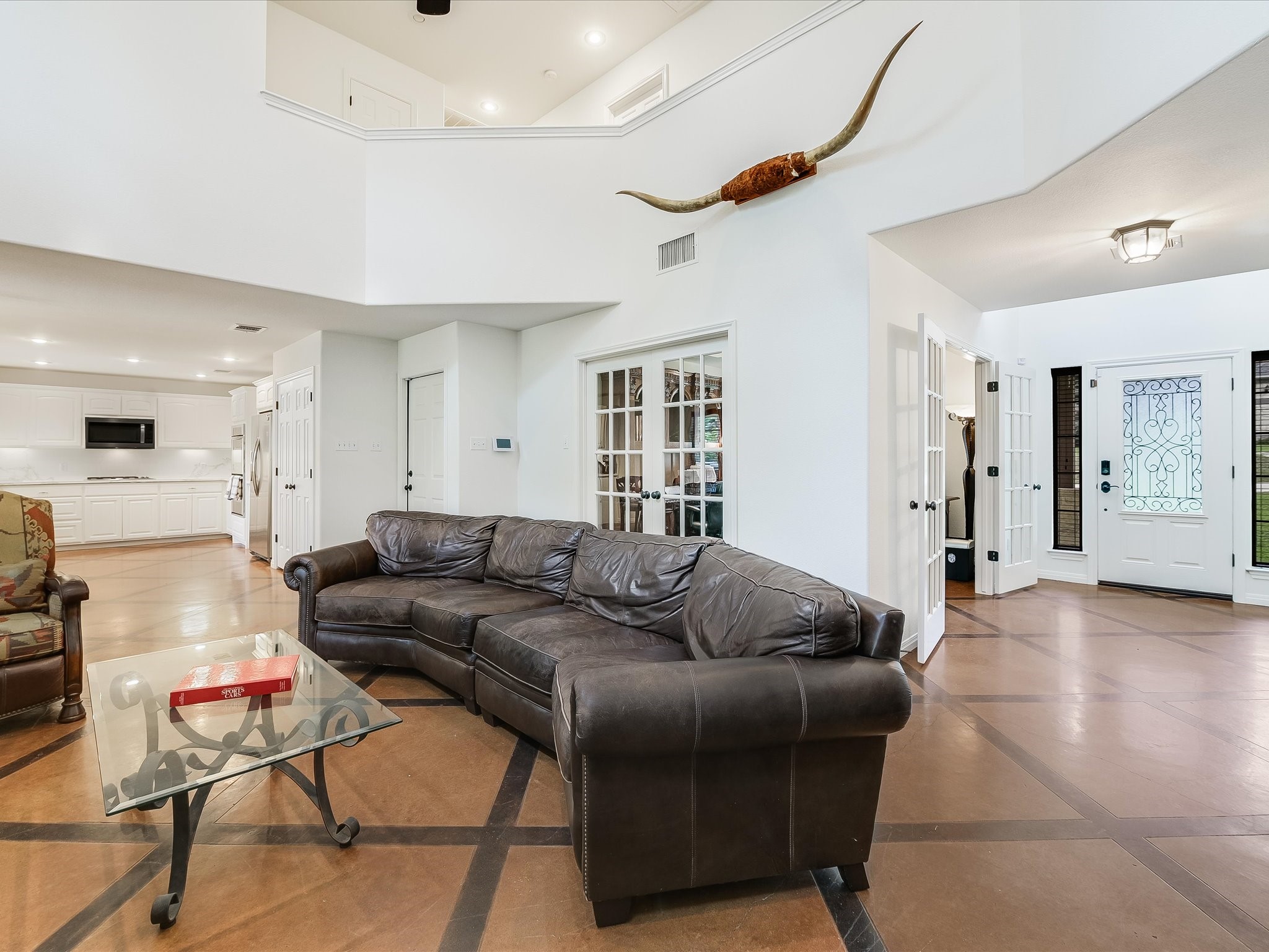 15214 Nightingale Lane Austin, TX 78734 - Photo 5 of 28 a living room with furniture and a wooden floor