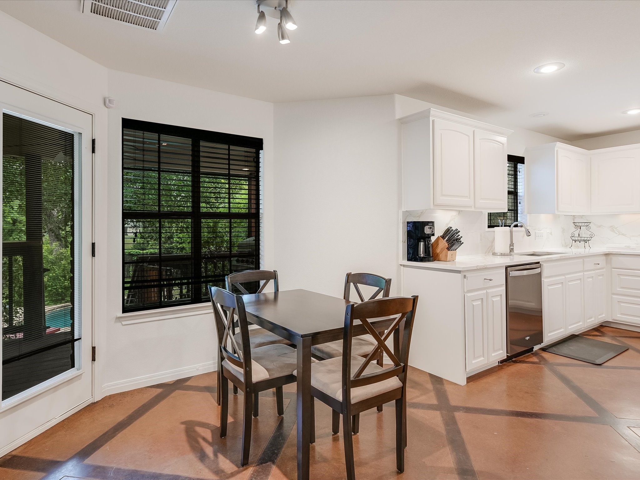 15214 Nightingale Lane Austin, TX 78734 - Photo 10 of 28 a dining room with furniture and window