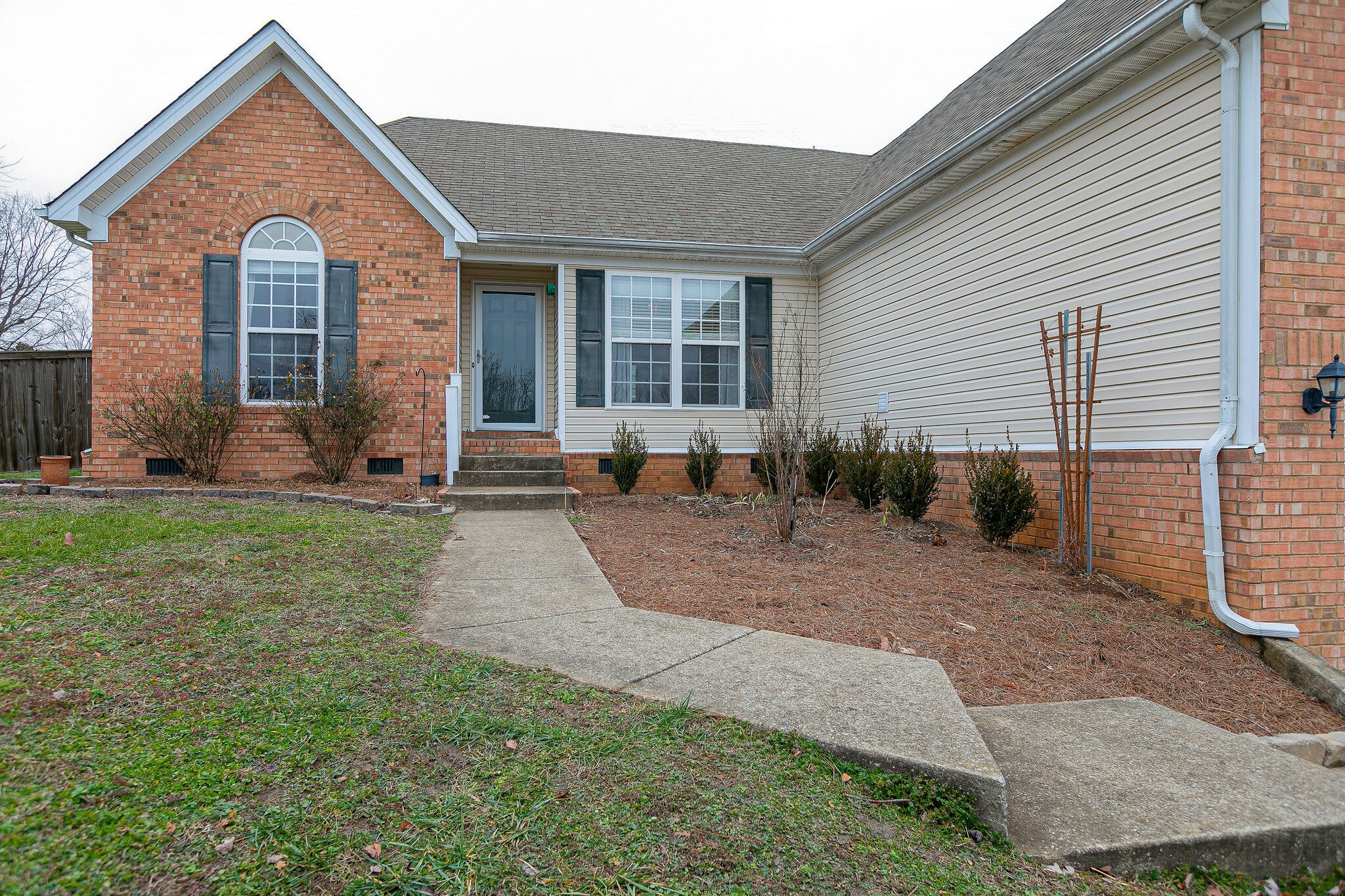 1905 Portway Road Spring Hill, TN 37174 - Photo 3 of 28 a front view of a house with a yard