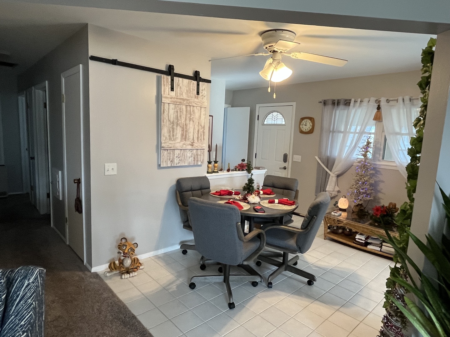 213 School Avenue Rochelle, IL 61068 - Photo 6 of 26 a workspace with furniture and a window
