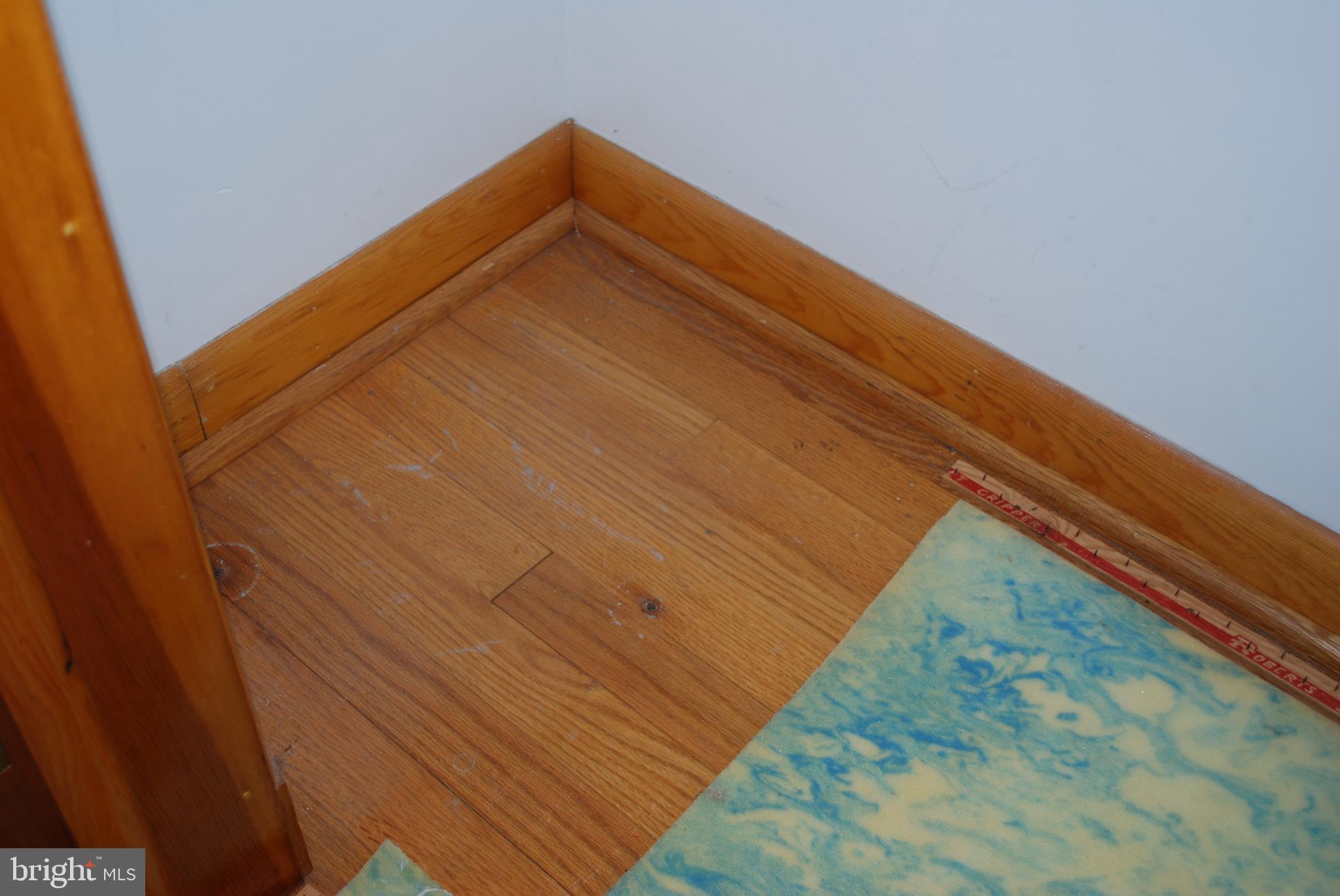 4432 Upper Beckleysville Road Hampstead, MD 21074 - Photo 11 of 23 Hardwood floors under carpet throughout the house