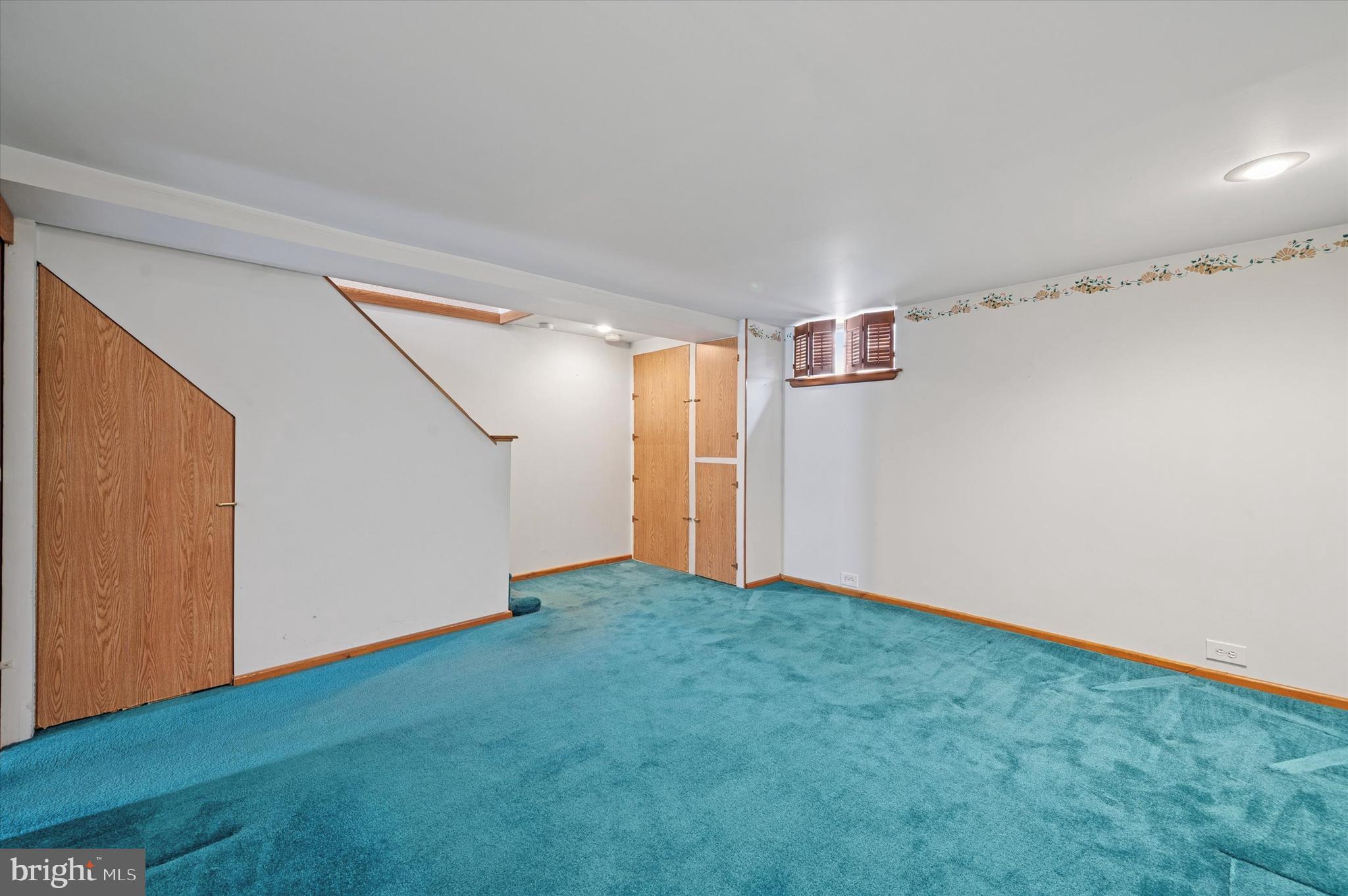 1075 Stratford Road Glenolden, PA 19036 - Photo 13 of 15 a view of an empty room with wooden floor