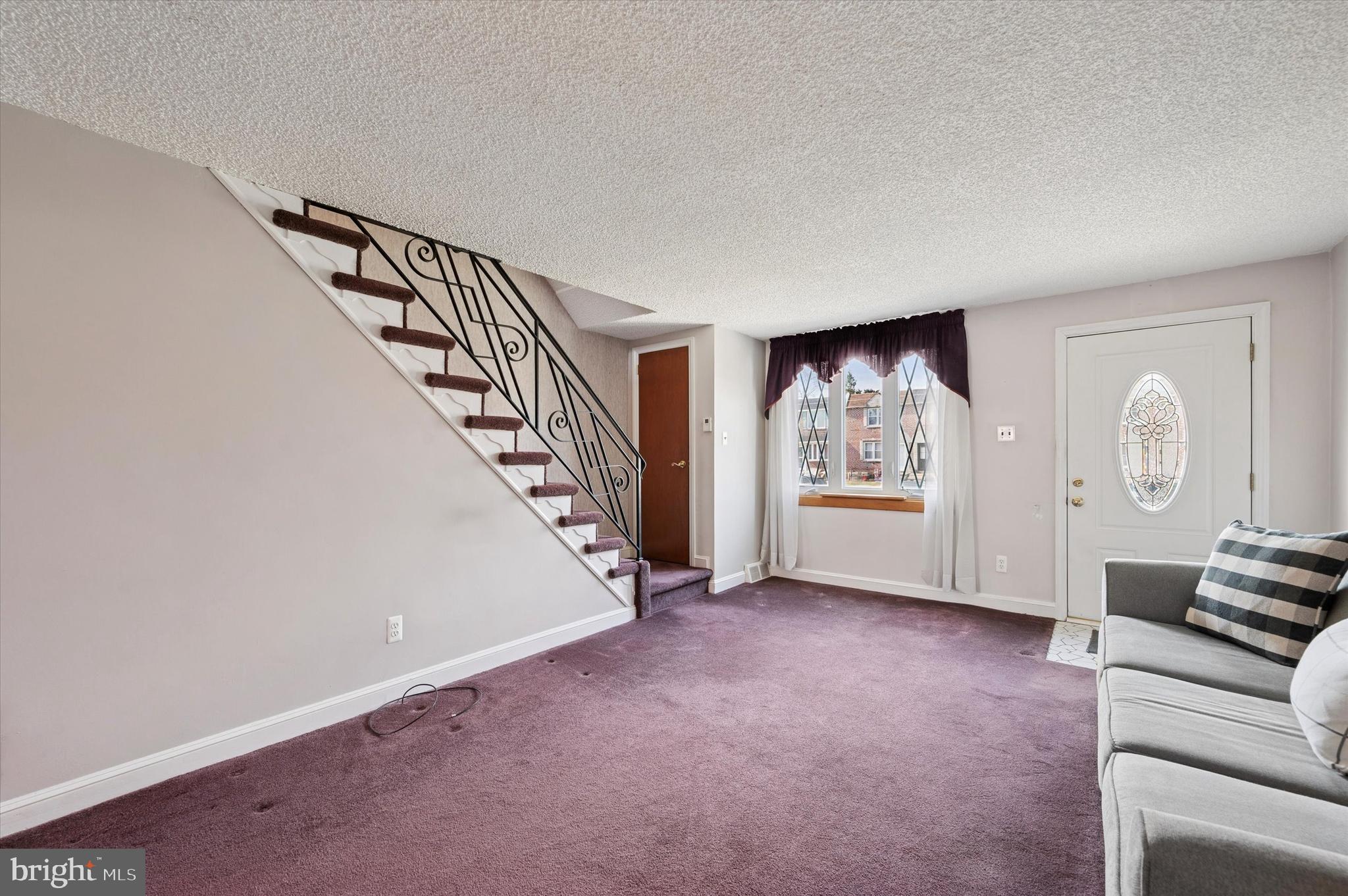1075 Stratford Road Glenolden, PA 19036 - Photo 2 of 15 a view of an empty room with a window