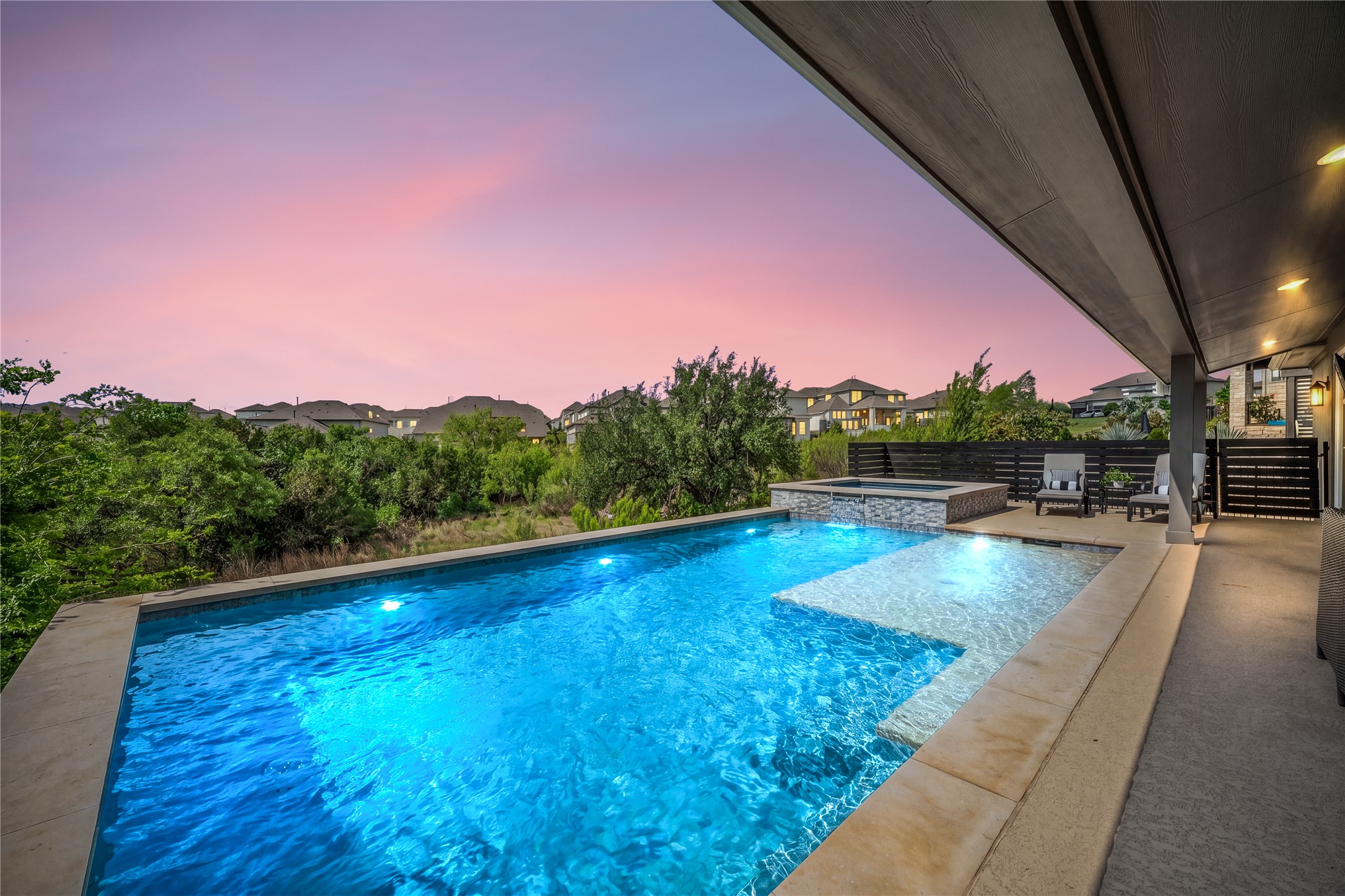 606 Bonfisk Bend Austin, TX 78738 - Photo 40 of 40 a view of a swimming pool and a yard