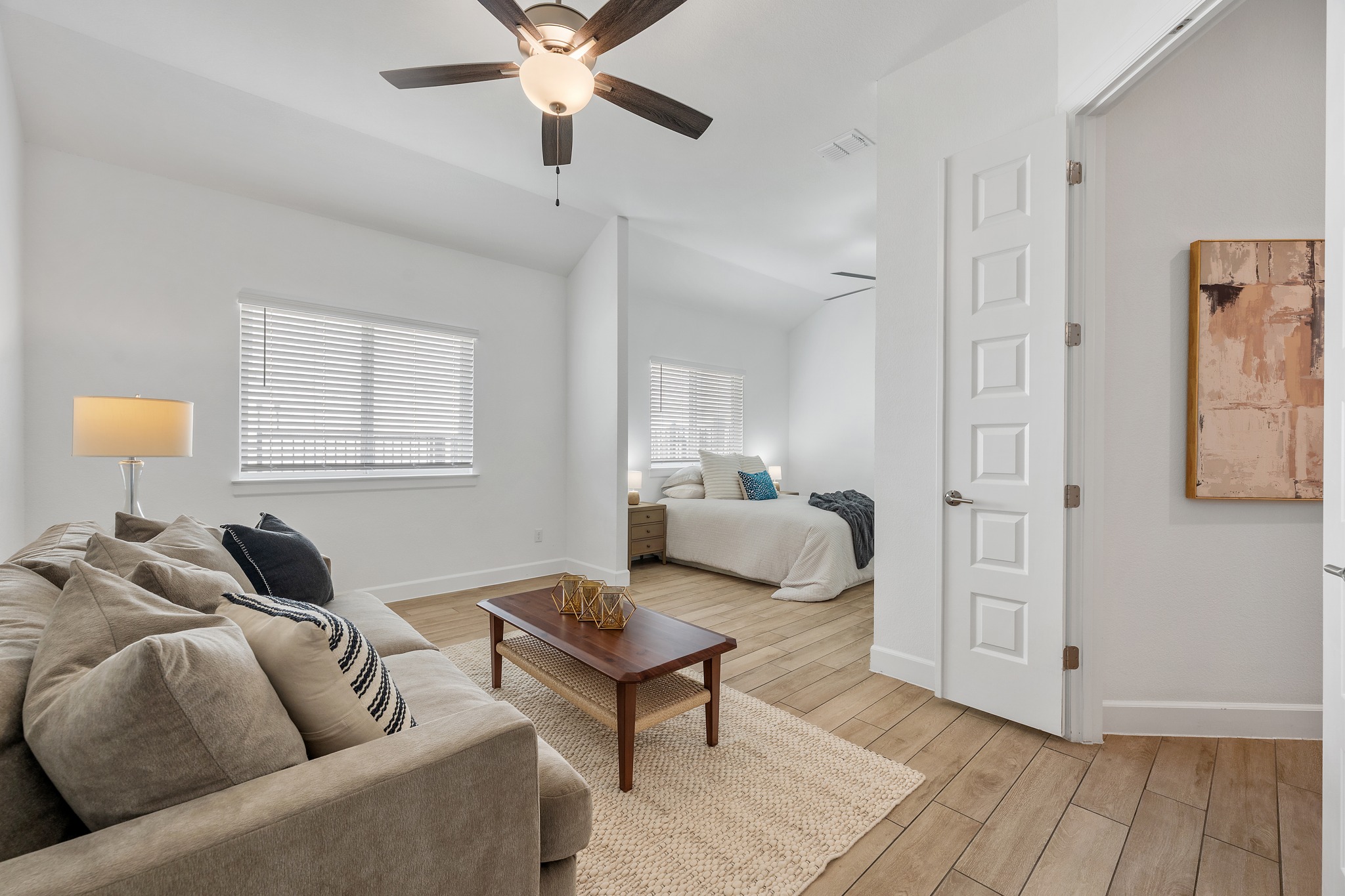 606 Bonfisk Bend Austin, TX 78738 - Photo 22 of 40 a living room with furniture and a window