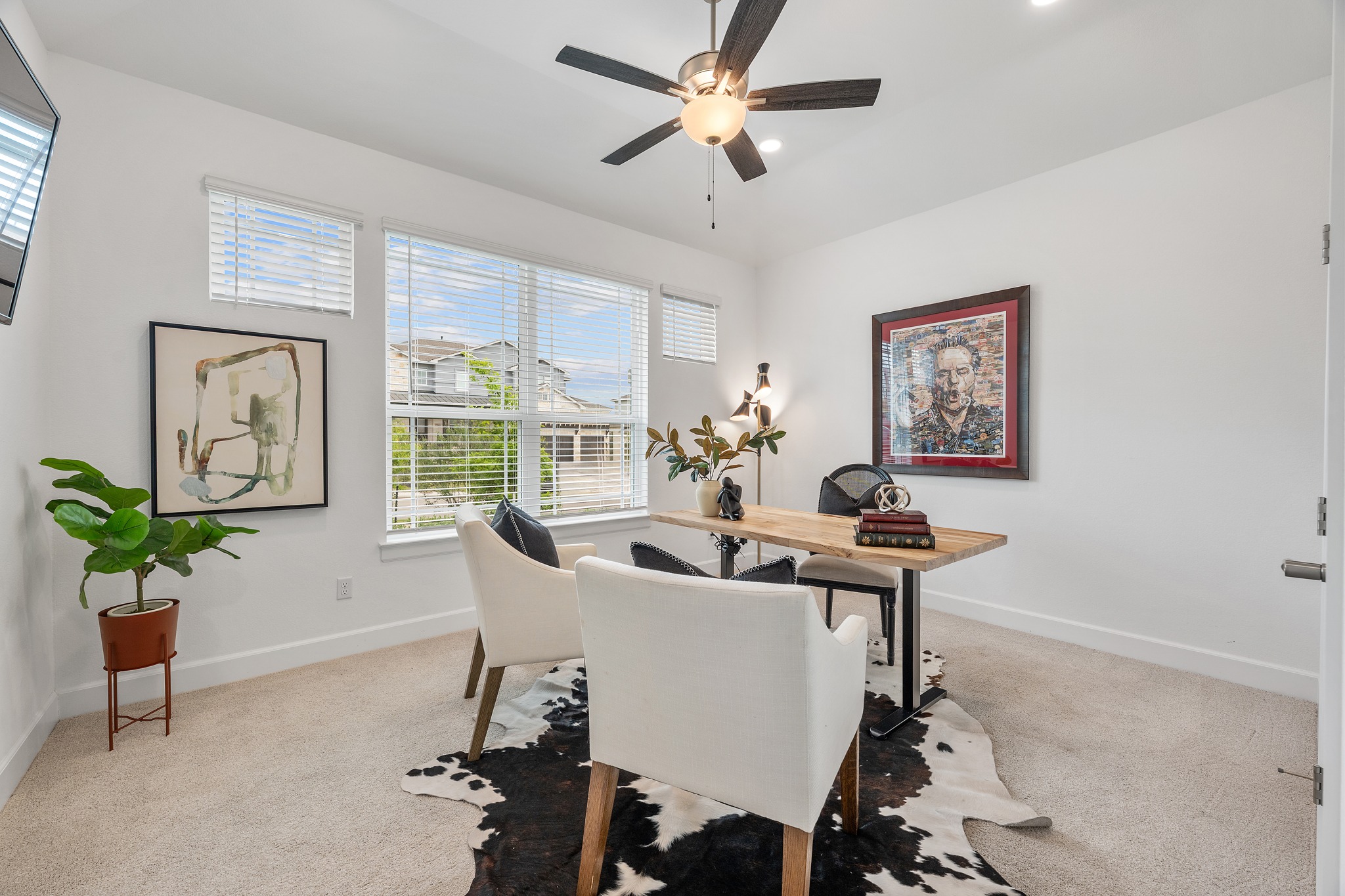 606 Bonfisk Bend Austin, TX 78738 - Photo 26 of 40 a view of a dining room with furniture window and wooden floor