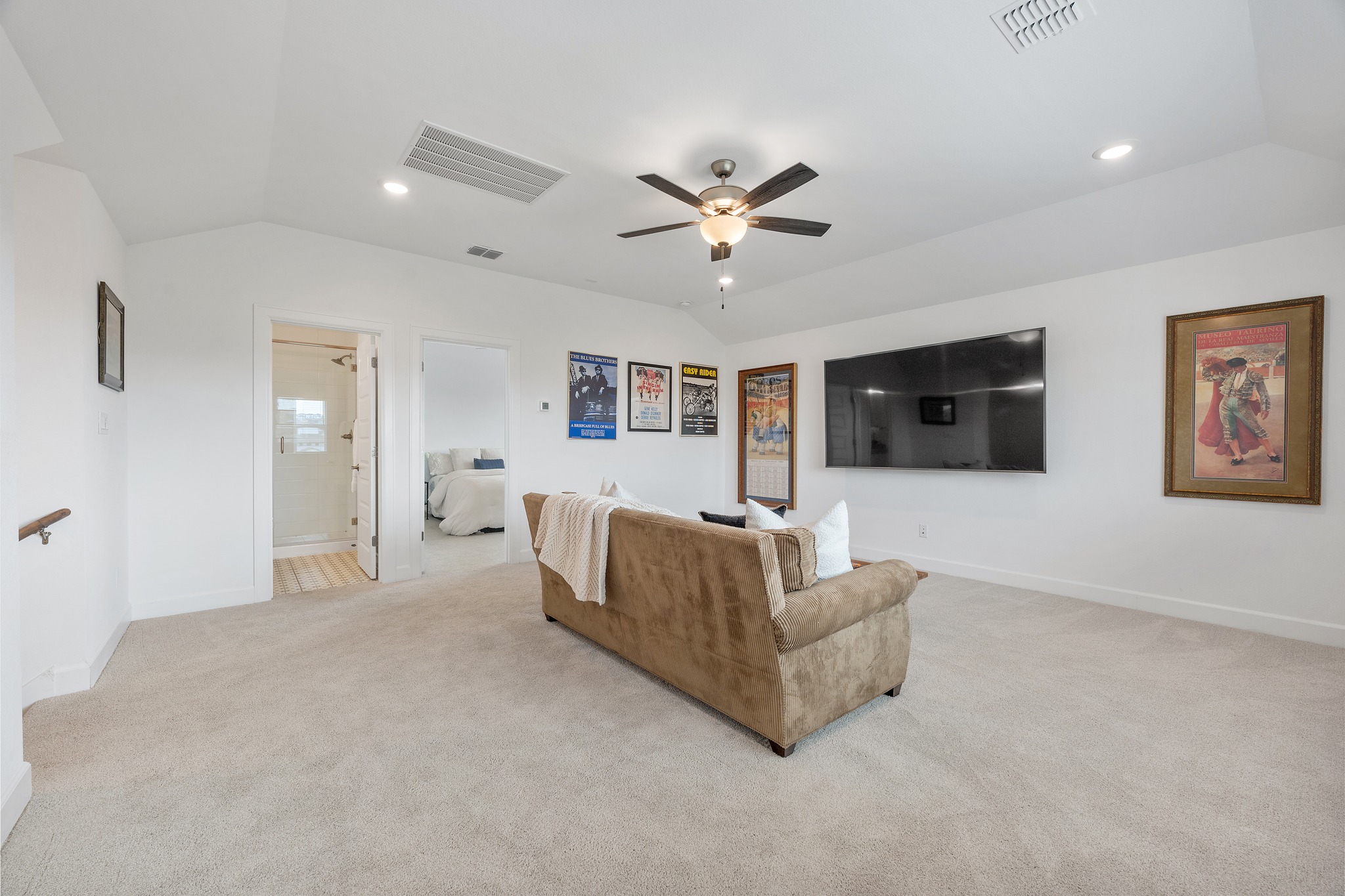 606 Bonfisk Bend Austin, TX 78738 - Photo 29 of 40 a living room with furniture and a wooden floor