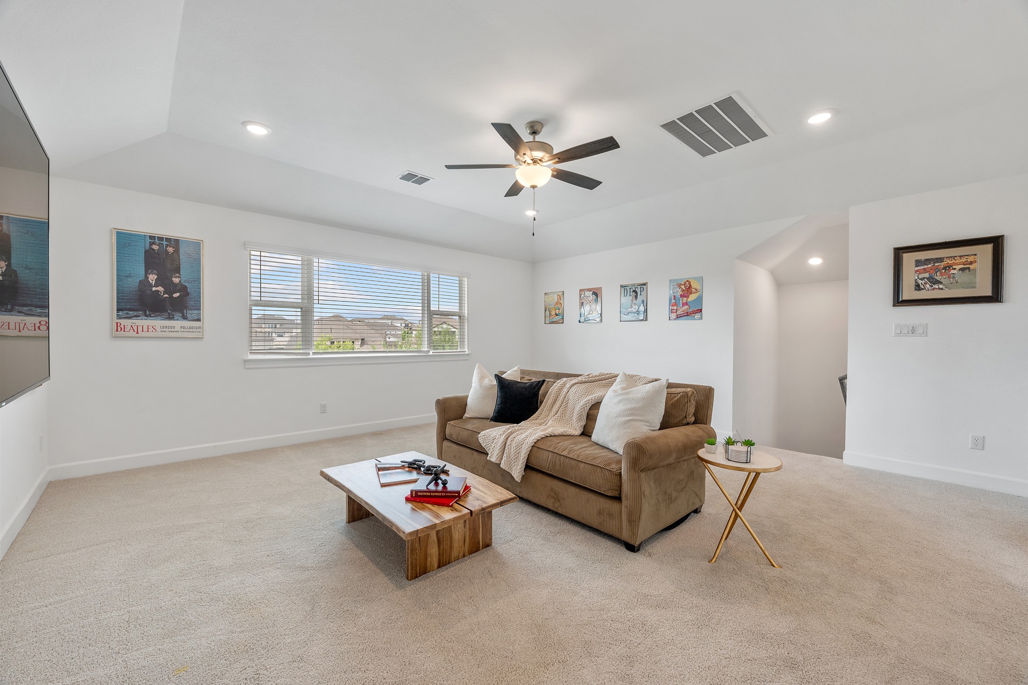 606 Bonfisk Bend Austin, TX 78738 - Photo 30 of 40 a living room with furniture and a large window