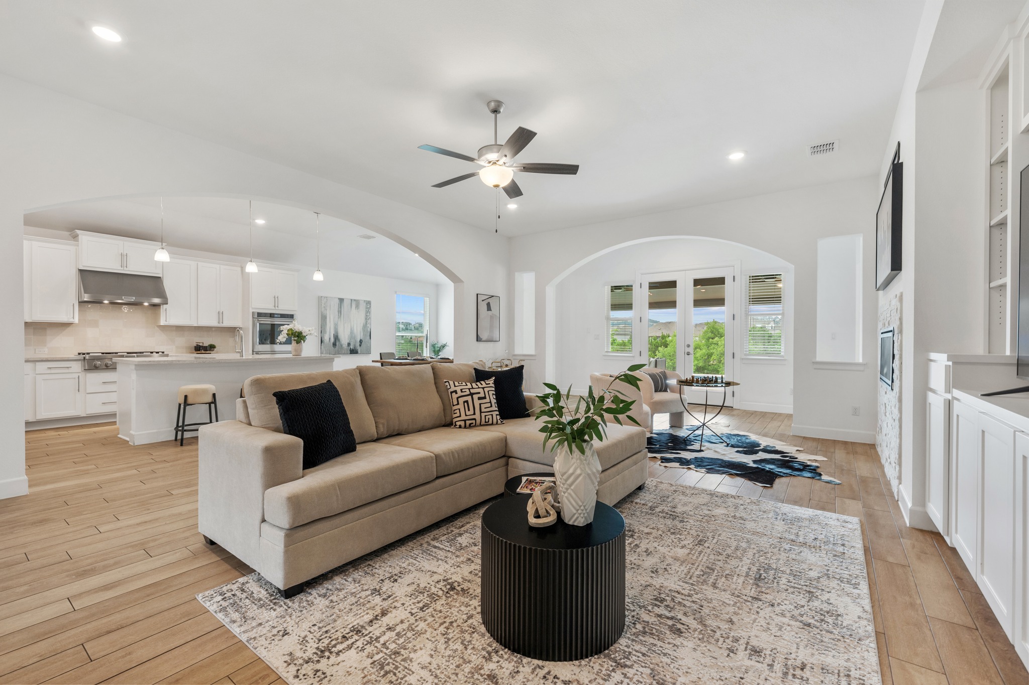 606 Bonfisk Bend Austin, TX 78738 - Photo 6 of 40 a living room with furniture and a large window