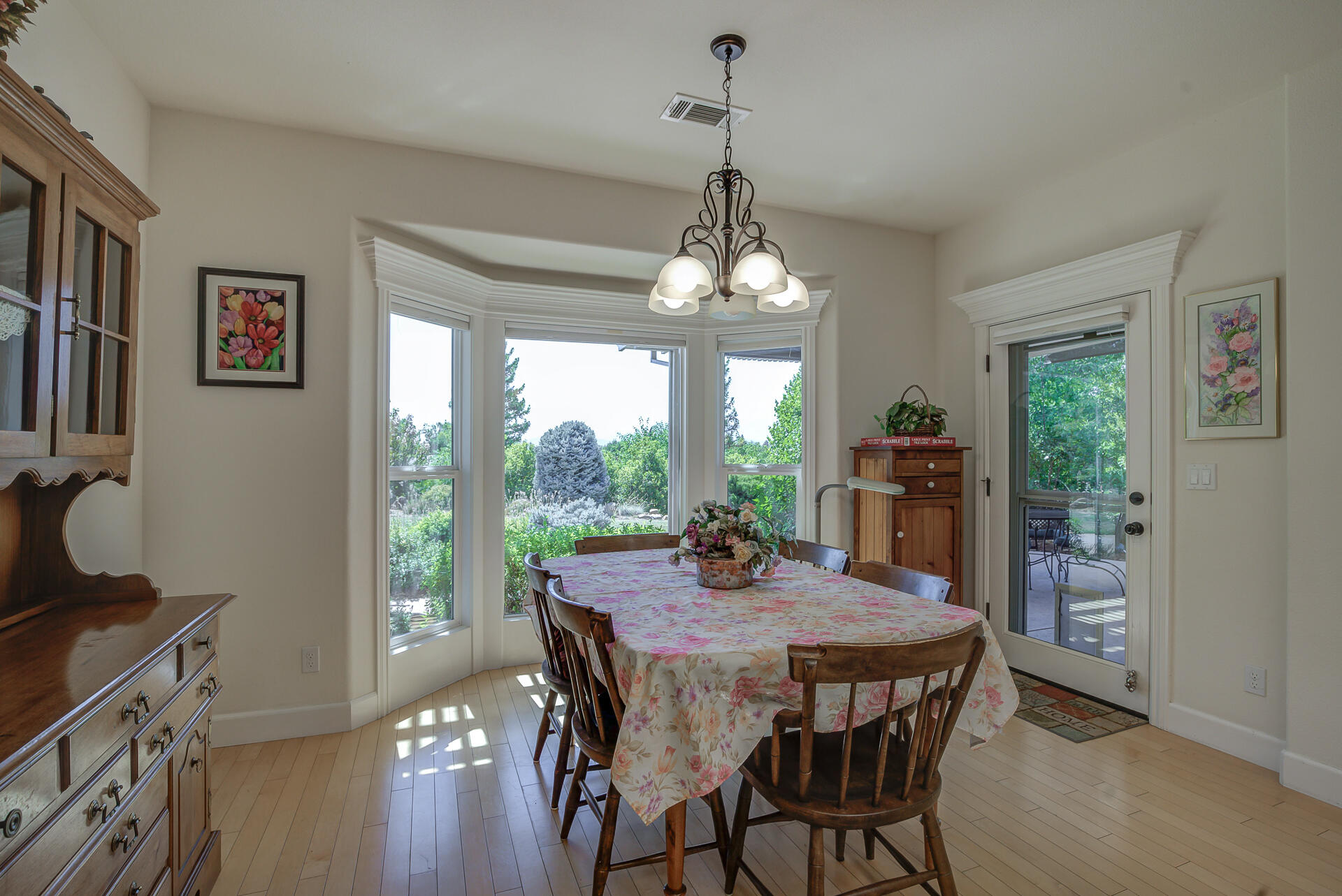2000 Princeton Way Redding, CA 96003 - Photo 17 of 60 a view of a dining room with furniture window and wooden floor