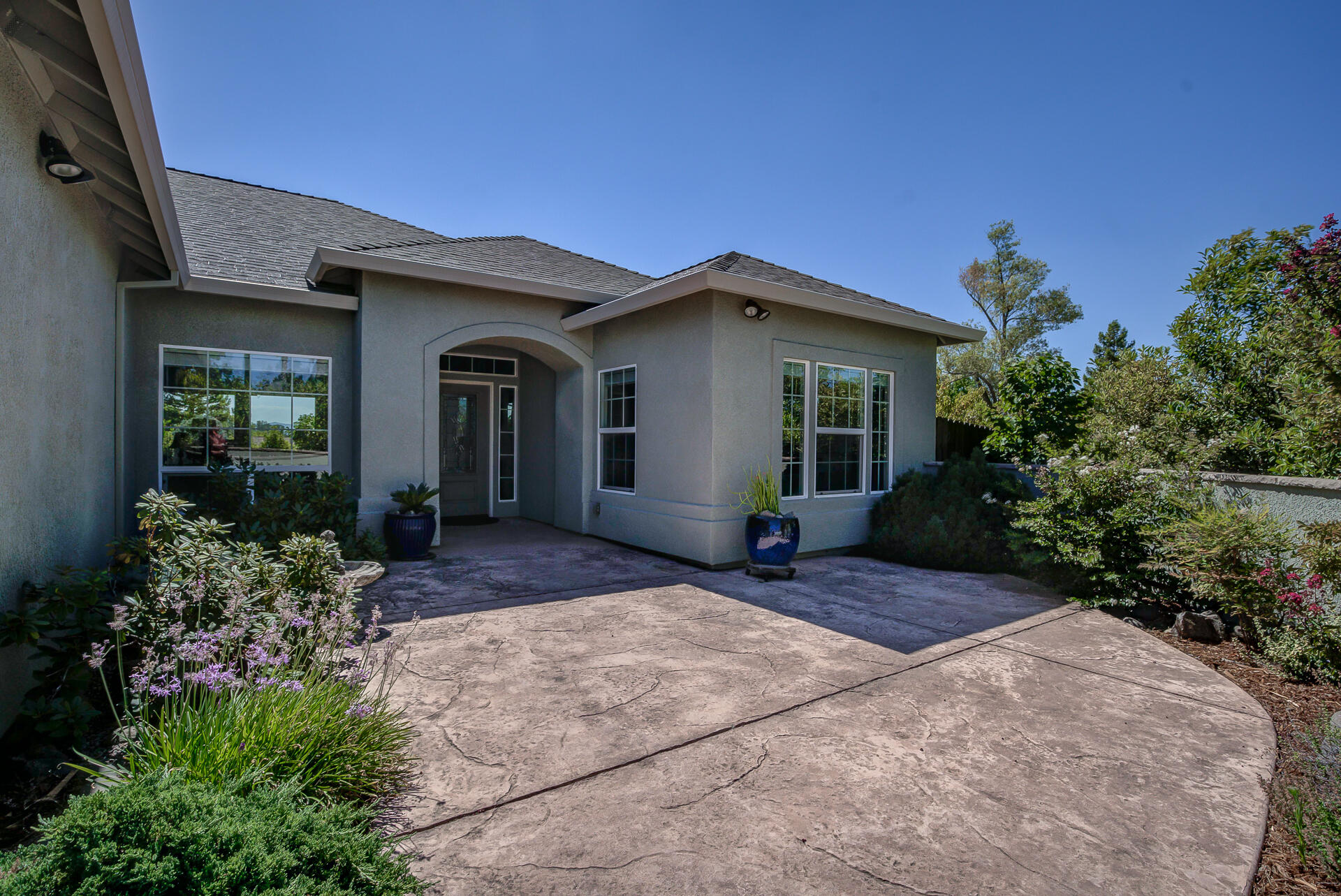 2000 Princeton Way Redding, CA 96003 - Photo 2 of 60 a front view of a house with a yard