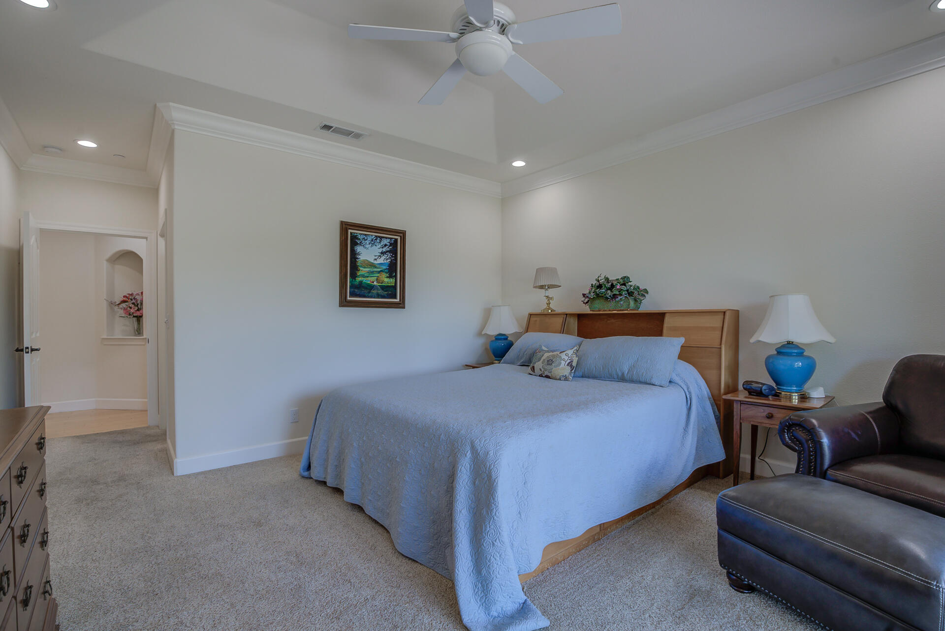 2000 Princeton Way Redding, CA 96003 - Photo 28 of 60 a bedroom with a bed and a couch