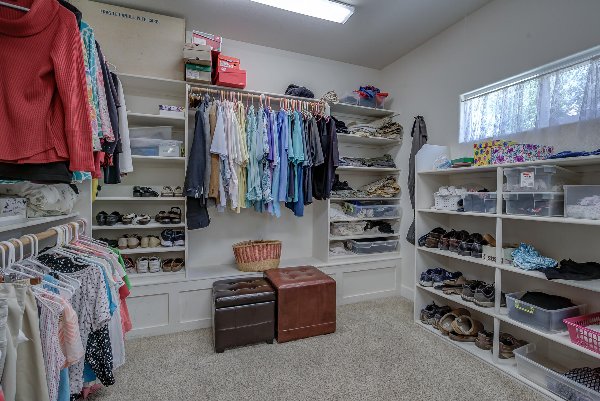 2000 Princeton Way Redding, CA 96003 - Photo 31 of 60 a view of walk in closet with clothes and shoes