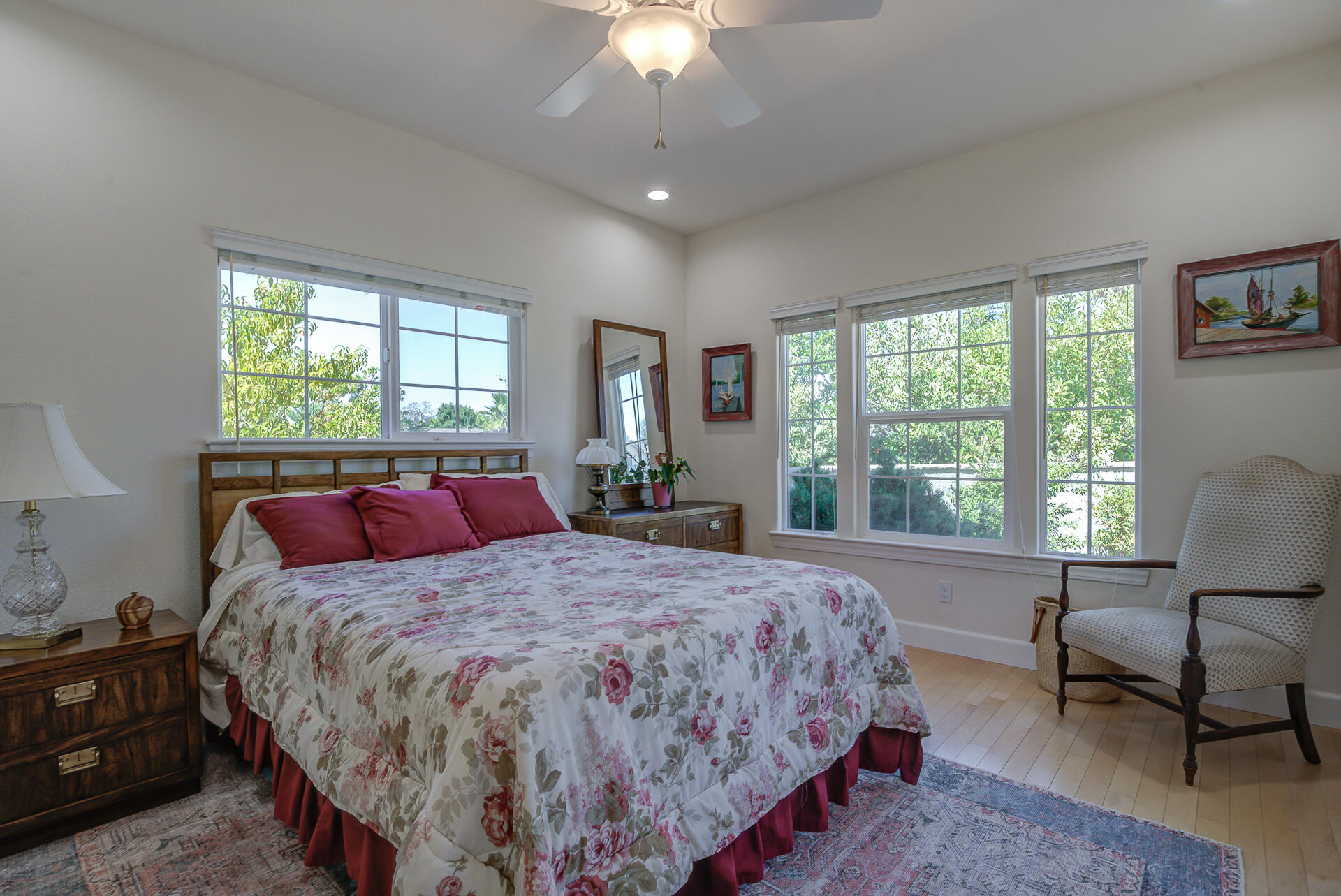 2000 Princeton Way Redding, CA 96003 - Photo 37 of 60 a bedroom with a bed and a chandelier