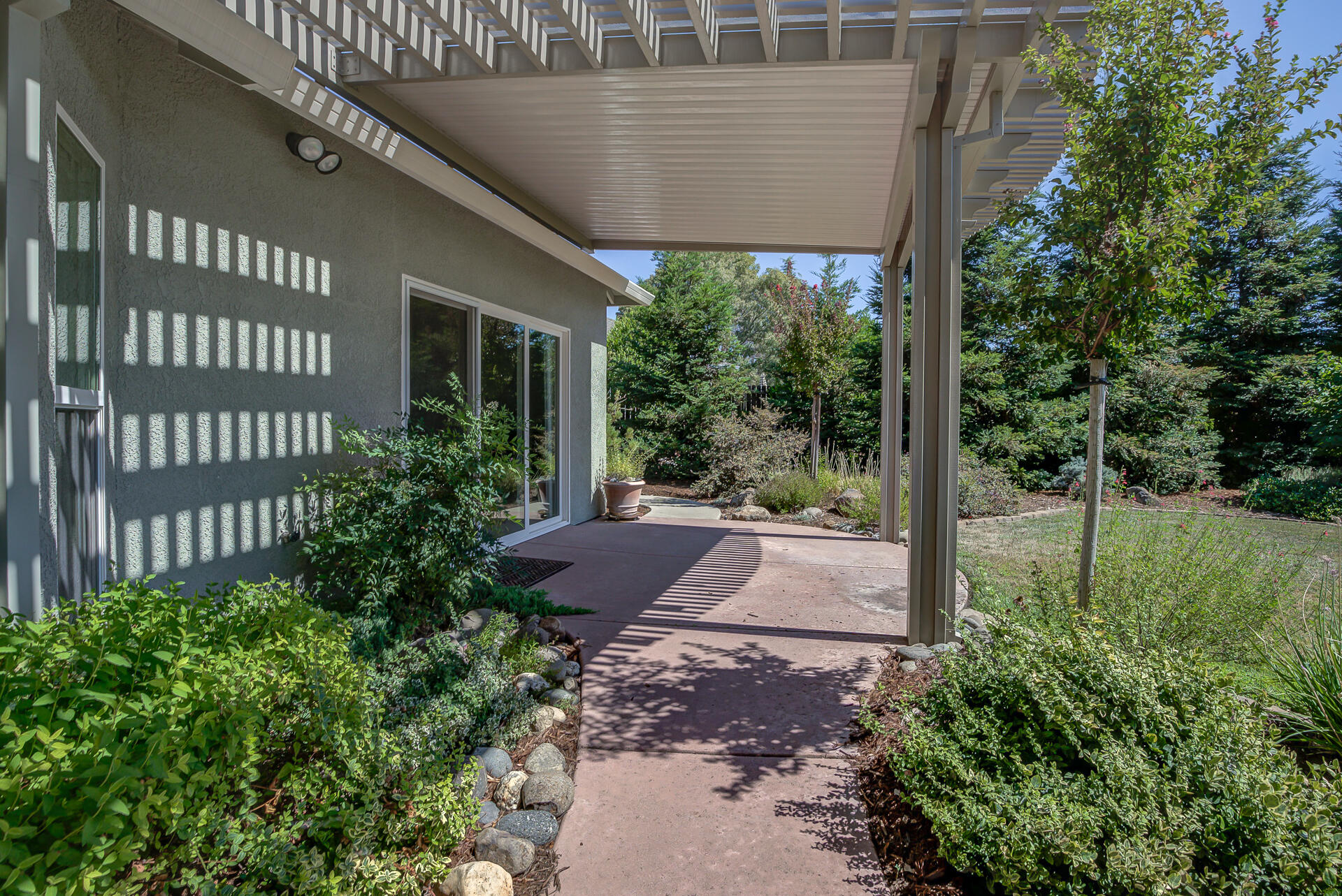 2000 Princeton Way Redding, CA 96003 - Photo 50 of 60 a view of a house with a yard and pathway
