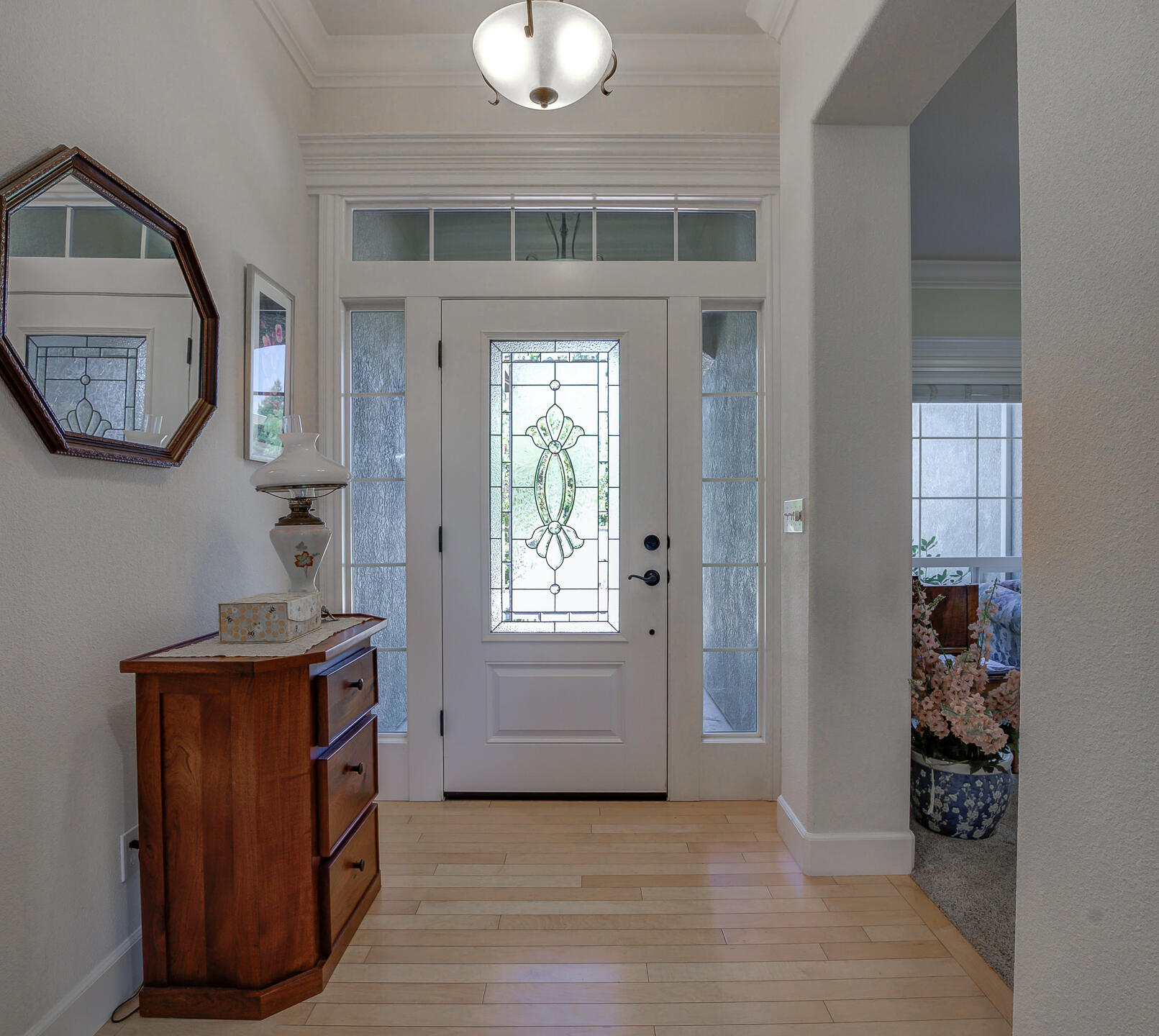 2000 Princeton Way Redding, CA 96003 - Photo 5 of 60 a view of an entryway with wooden floor and cabinet