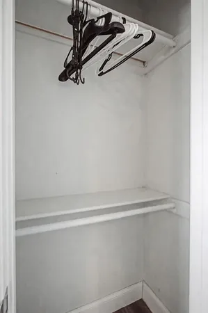a view of a room with racks on the wall