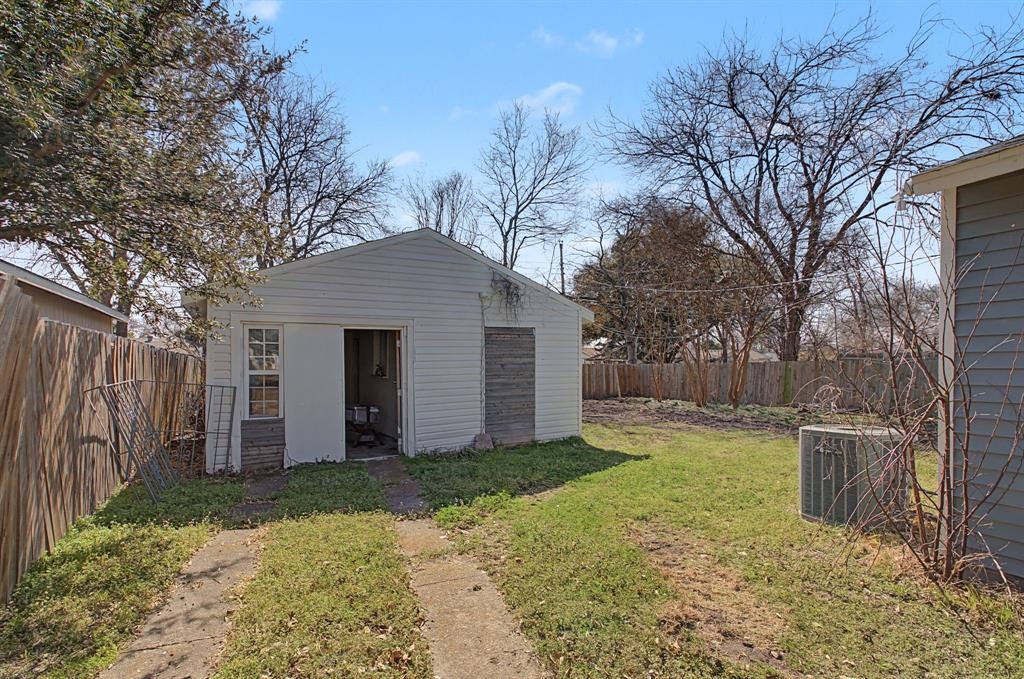 2508 Hillglenn Road Dallas, TX 75228 - Photo 14 of 26 a view of a house with a yard covered in snow