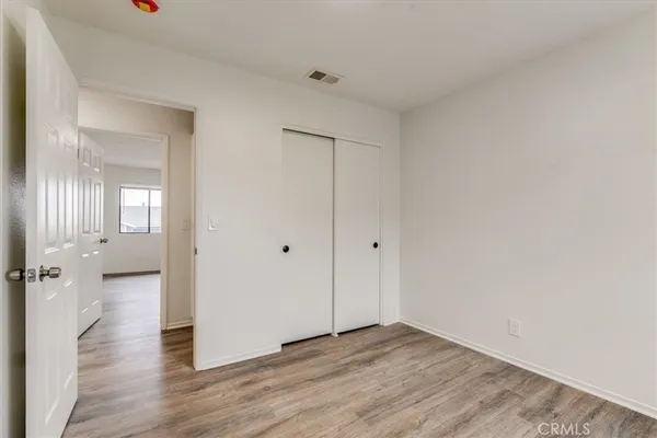 a view of a livingroom with wooden floor