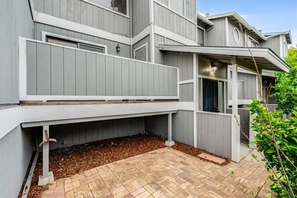 a house view with a outdoor space