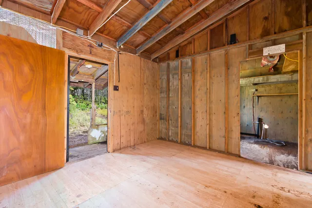 a bathroom with a shower and a toilet