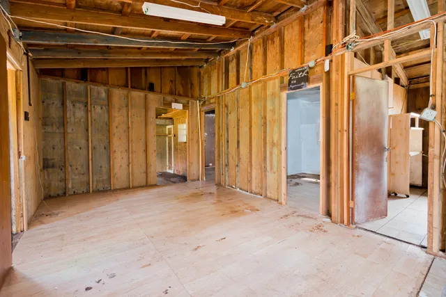 a bathroom with a shower and a toilet