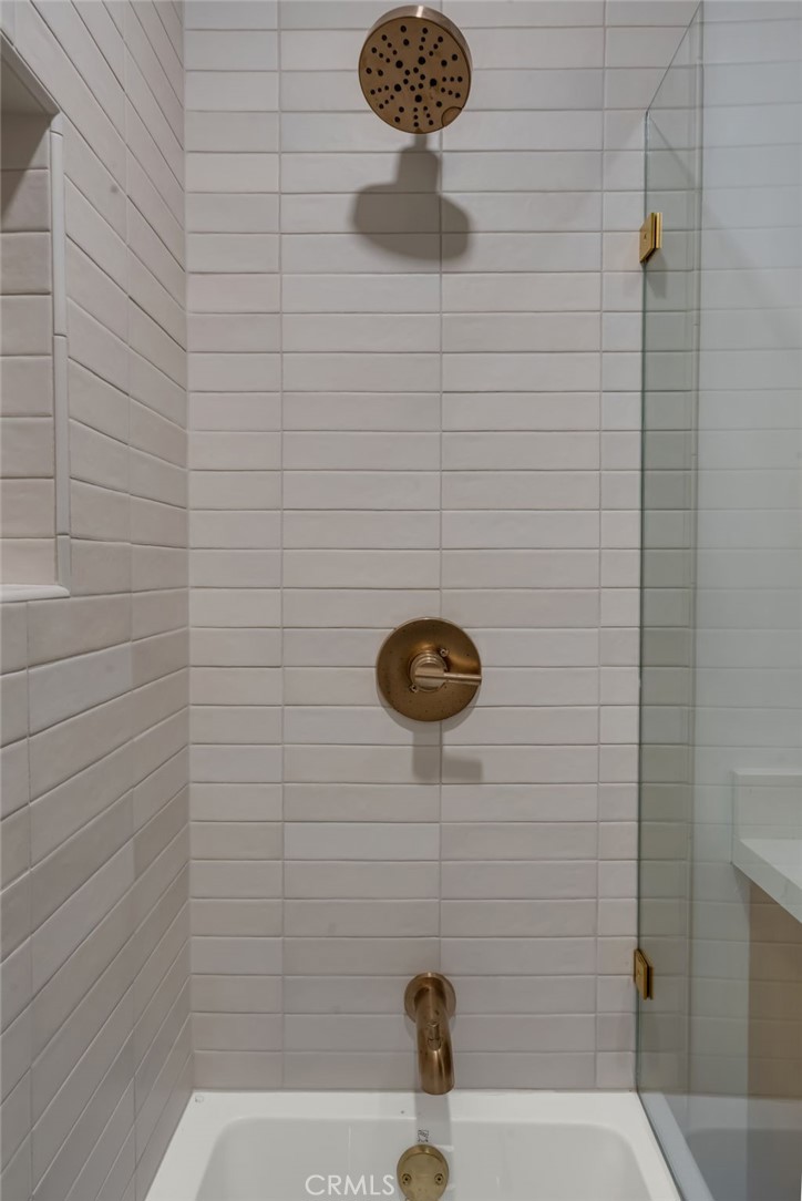 3682 Buckingham Road Los Angeles, CA 90016 - Photo 18 of 30 a bathroom with a shower