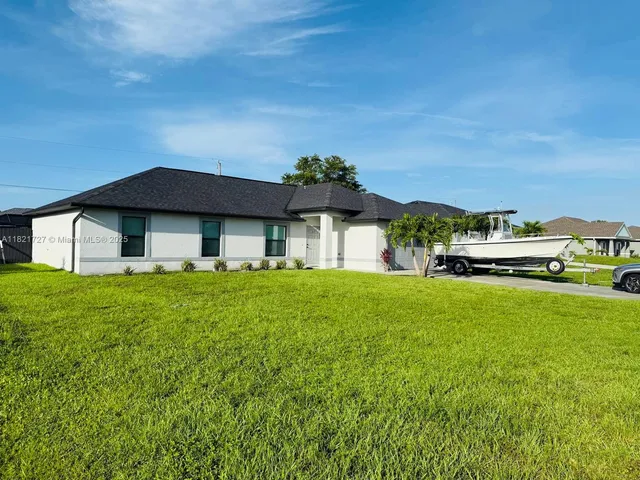 a house view with a garden space