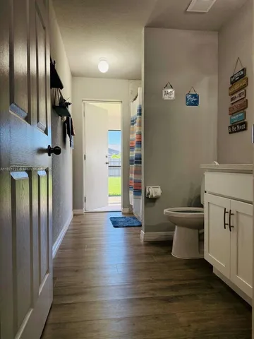 a bathroom with a sink and a toilet