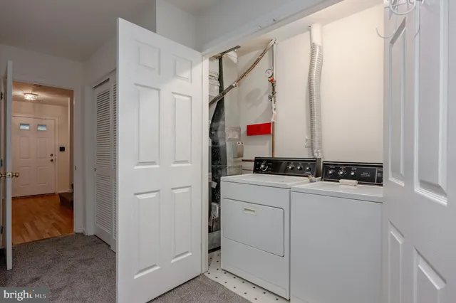 a room that has a sink and a mirror