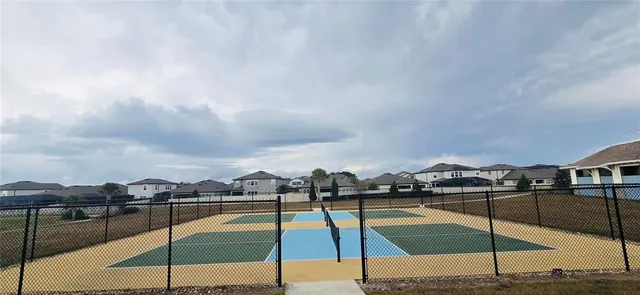 a view of outdoor space with swimming pool