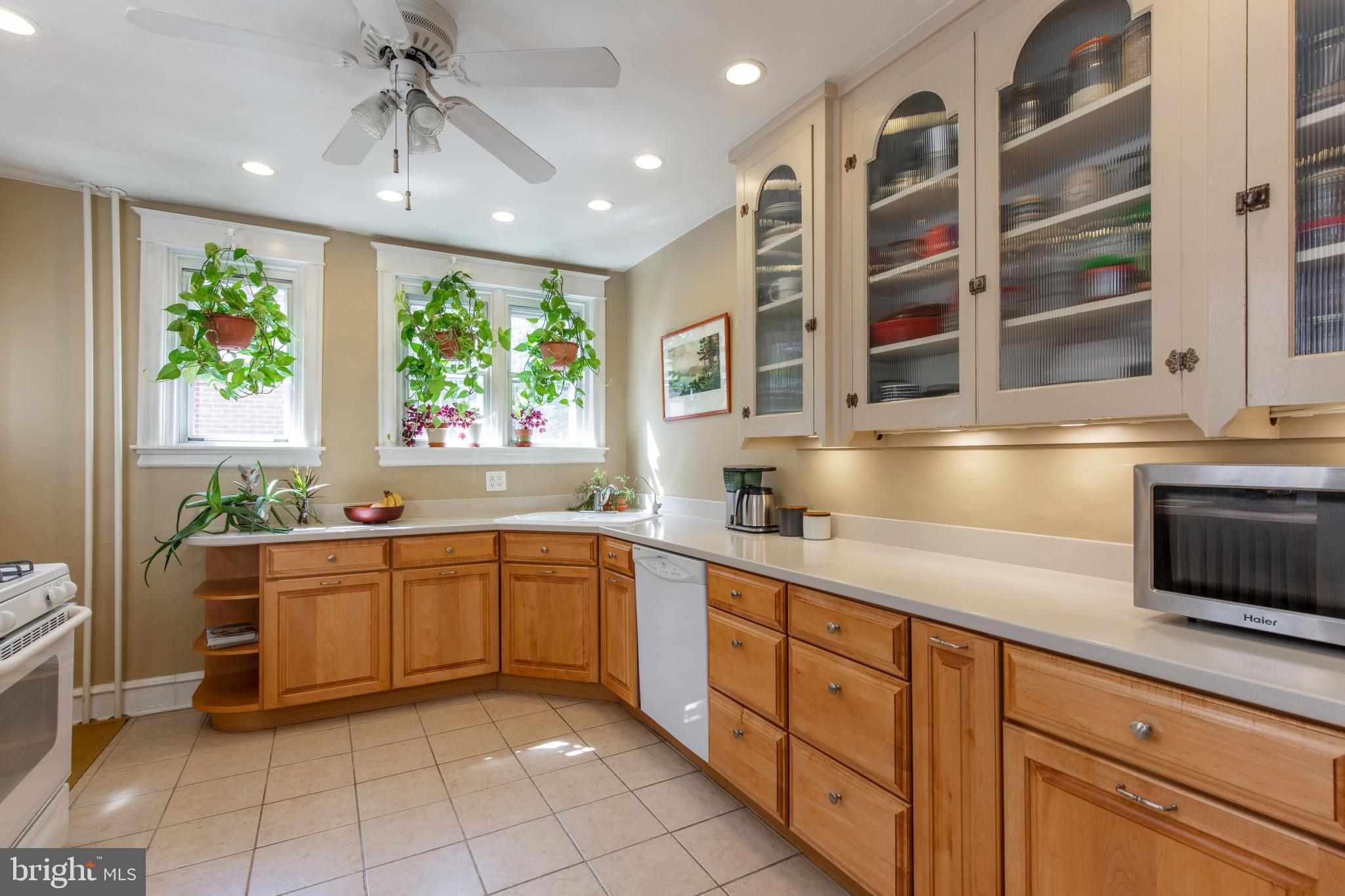 148 Roumfort Road Philadelphia, PA 19119 - Photo 13 of 33 Sunny kitchen with ample storage and counter space